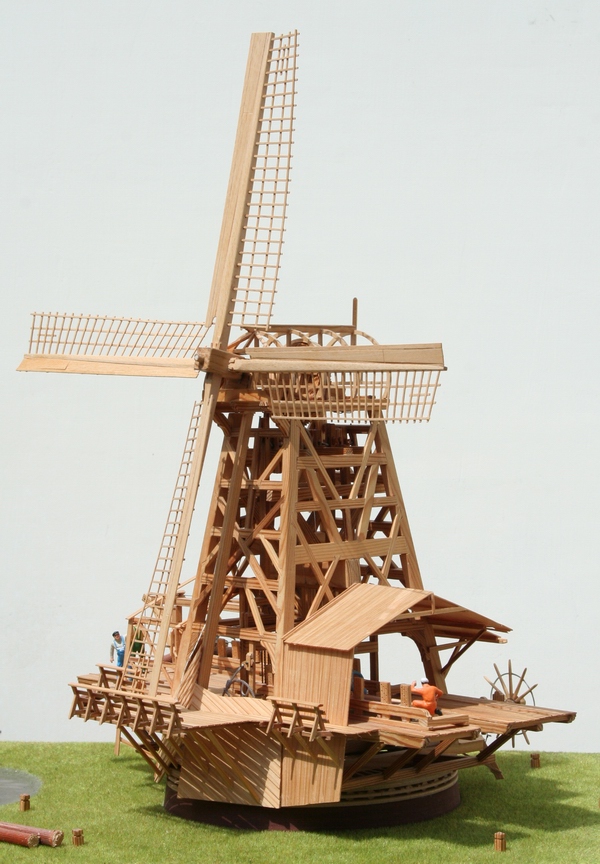 dozen scale models of traditional dutch windmills the text is in dutch