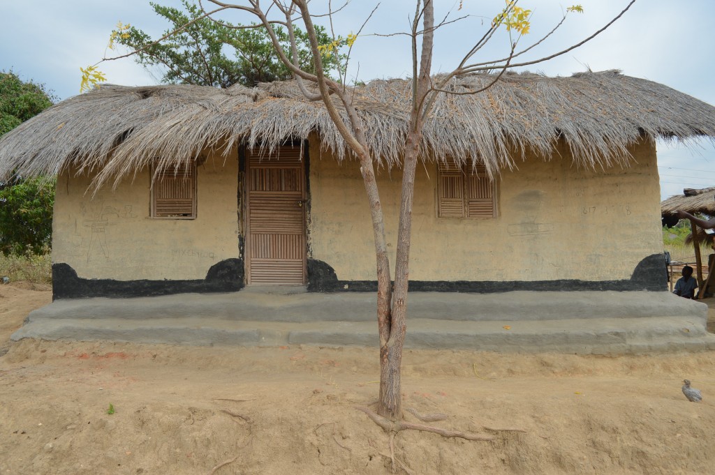 Malawi home built with rammed earth and thatch roof in Chizogwe village
